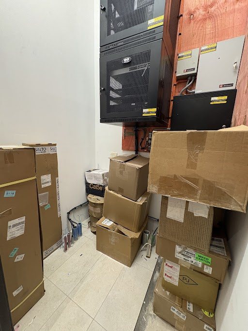 Network equipment racks and low-voltage infrastructure during construction